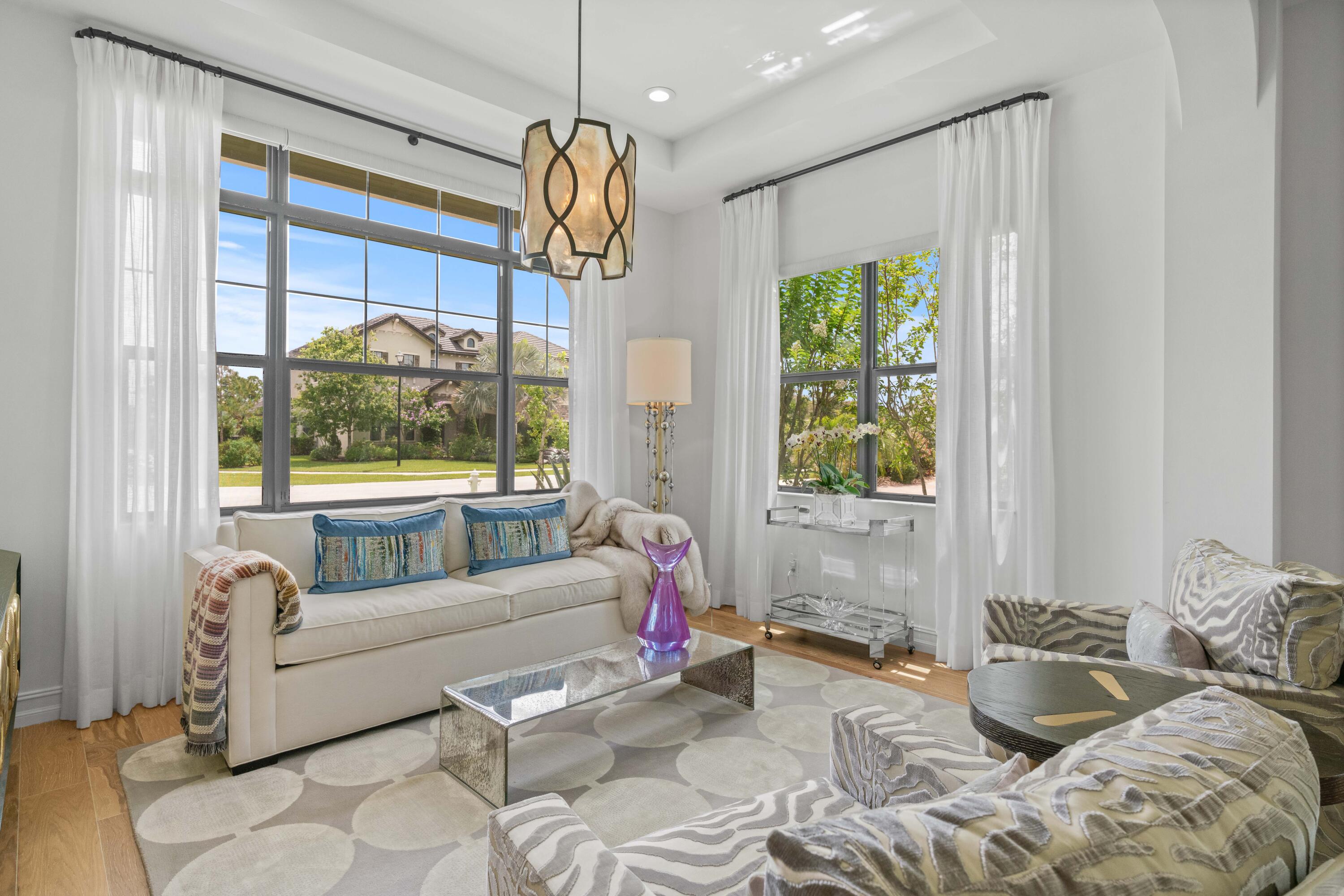 8208 Southeast Red Root Way Jupiter, FL 33458 - Photo 10 of 113 front living room sitting area