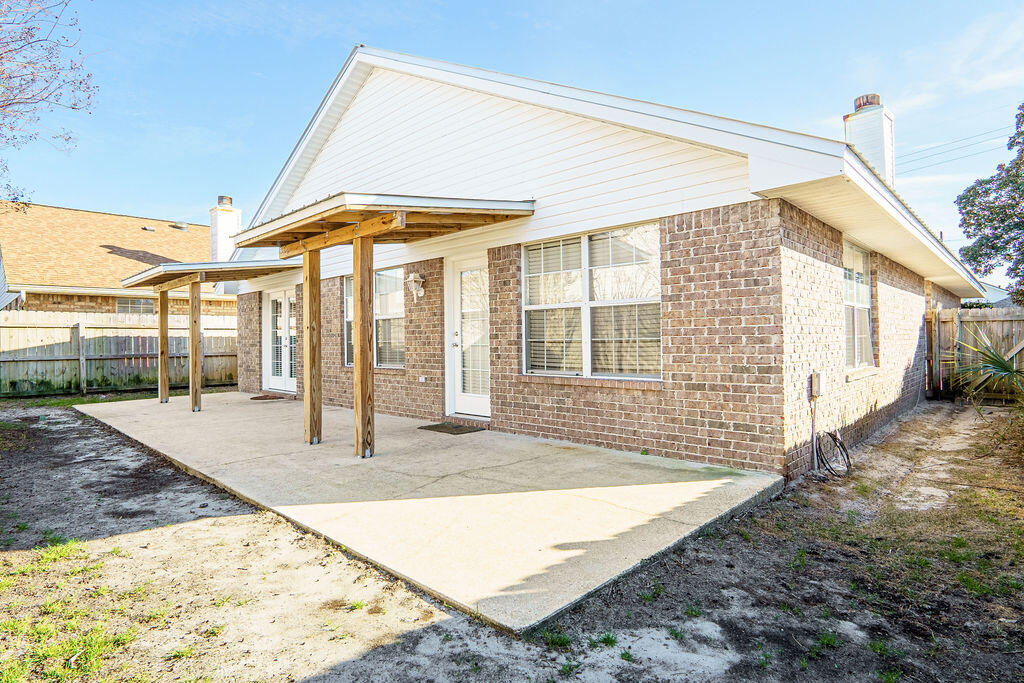 4641 Sunsail Circle Destin, FL 32541 - Photo 27 of 28 a view of a house with backyard