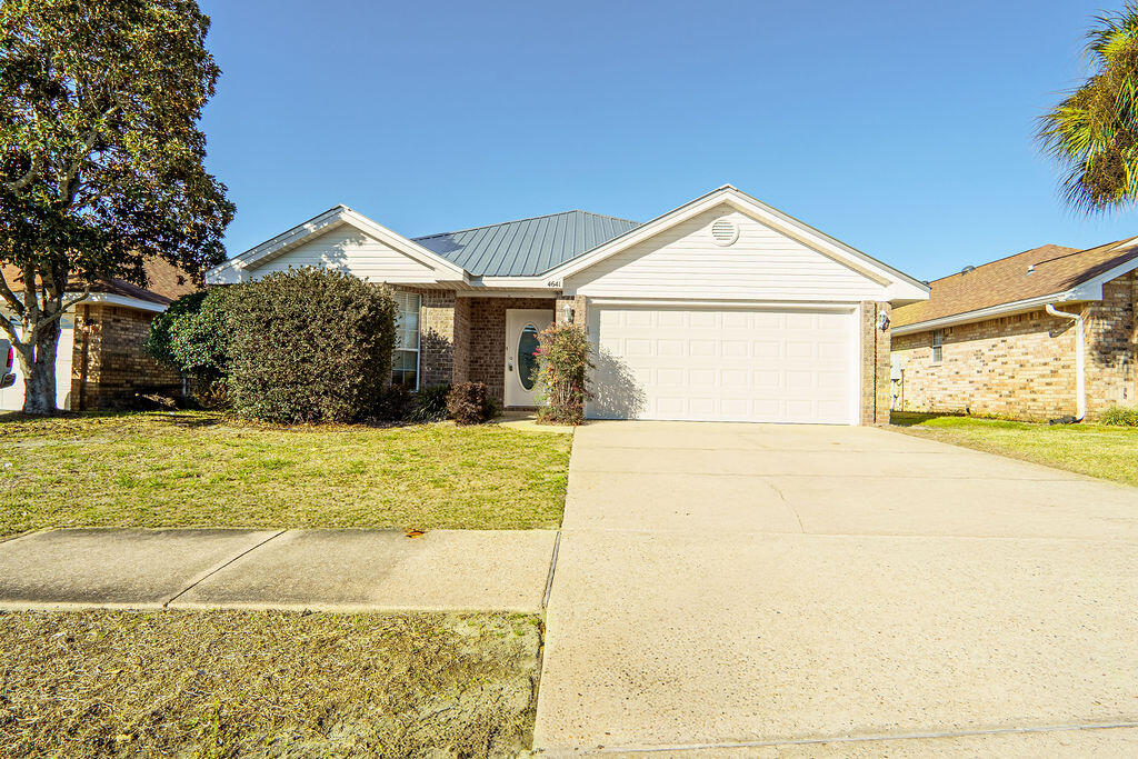 4641 Sunsail Circle Destin, FL 32541 - Photo 3 of 28 a view of outdoor space yard and front view of a house