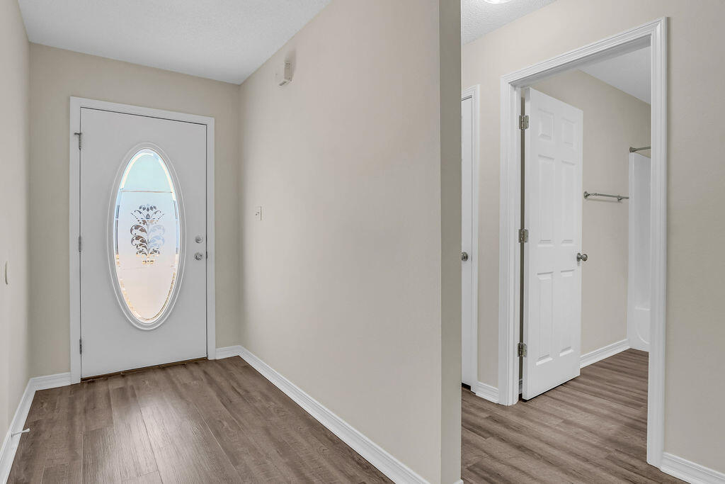 4641 Sunsail Circle Destin, FL 32541 - Photo 4 of 28 a view of front door with wooden floor