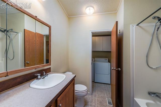 39045 Big Springs Road Rush, CO 80833 - Photo 8 of 22 Primary bath that connects to laundry room!