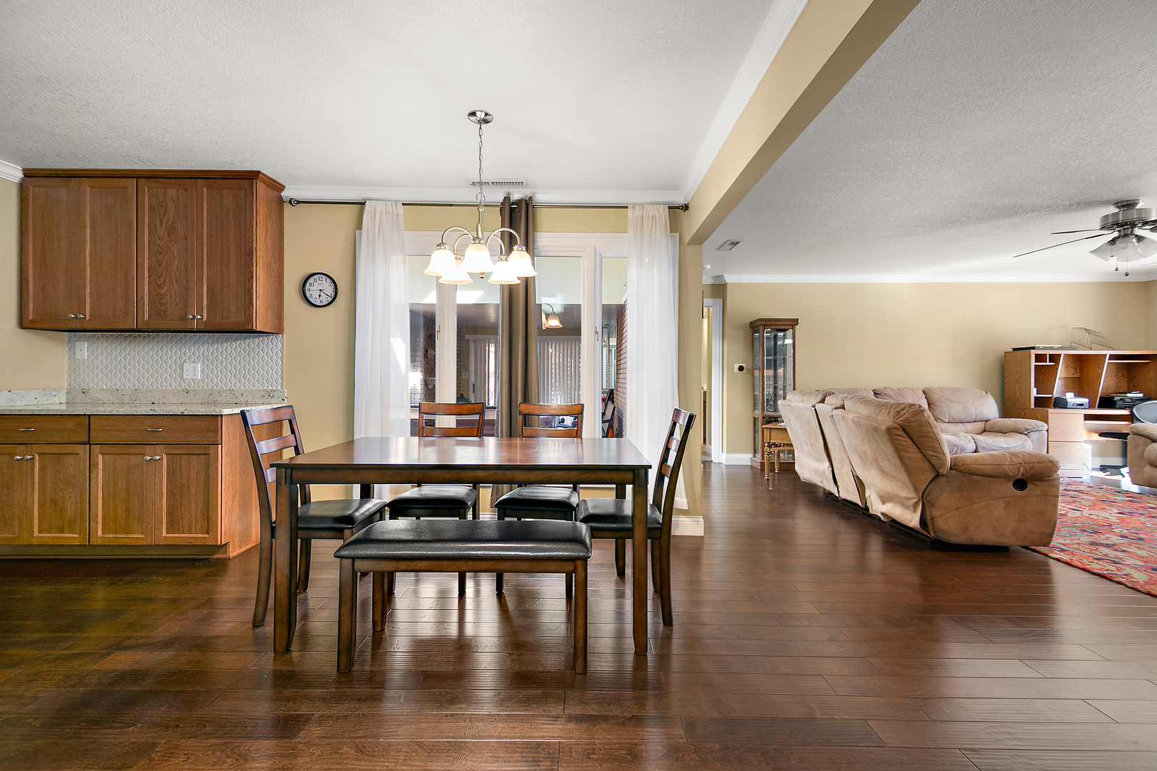 1305 Oaktree Lane Kankakee, IL 60901 - Photo 16 of 47 a view of a dining room with furniture and wooden floor