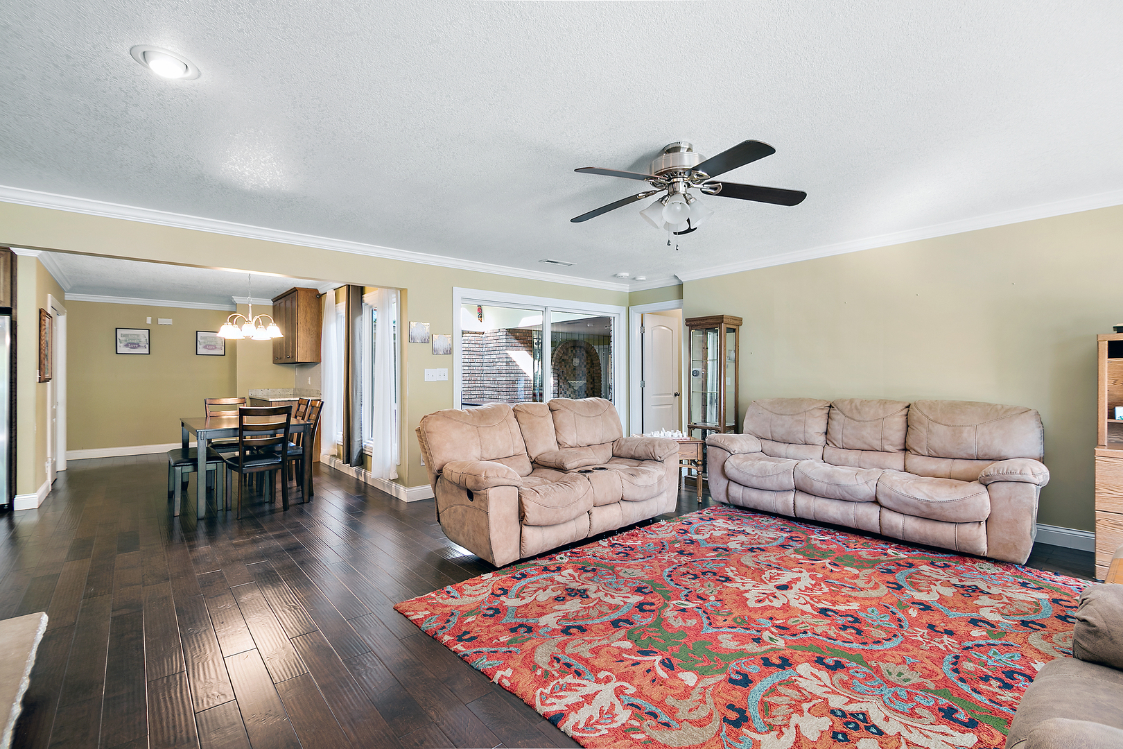 1305 Oaktree Lane Kankakee, IL 60901 - Photo 20 of 47 a living room with furniture and a wooden floor