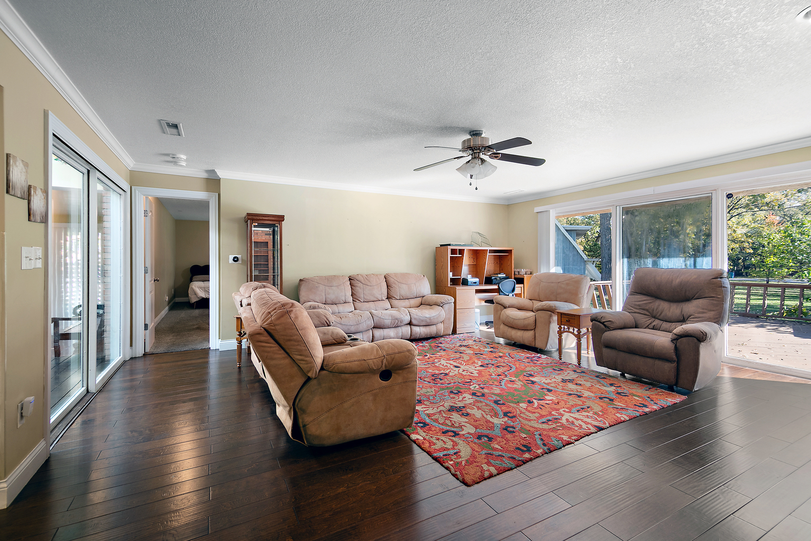 1305 Oaktree Lane Kankakee, IL 60901 - Photo 23 of 47 a living room with furniture and a wooden floor