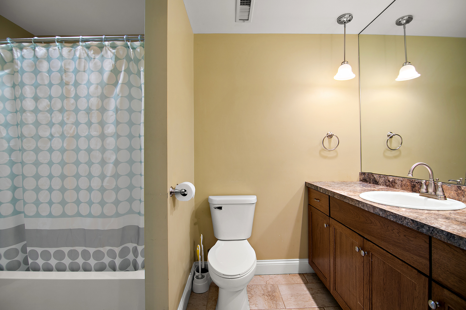 1305 Oaktree Lane Kankakee, IL 60901 - Photo 26 of 47 a bathroom with a granite countertop sink toilet and shower