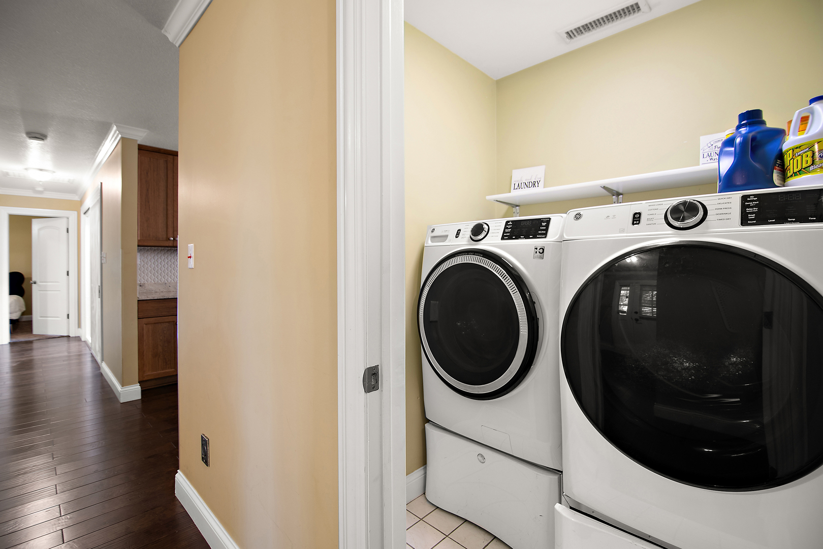 1305 Oaktree Lane Kankakee, IL 60901 - Photo 35 of 47 a view of a hallway with washer and dryer