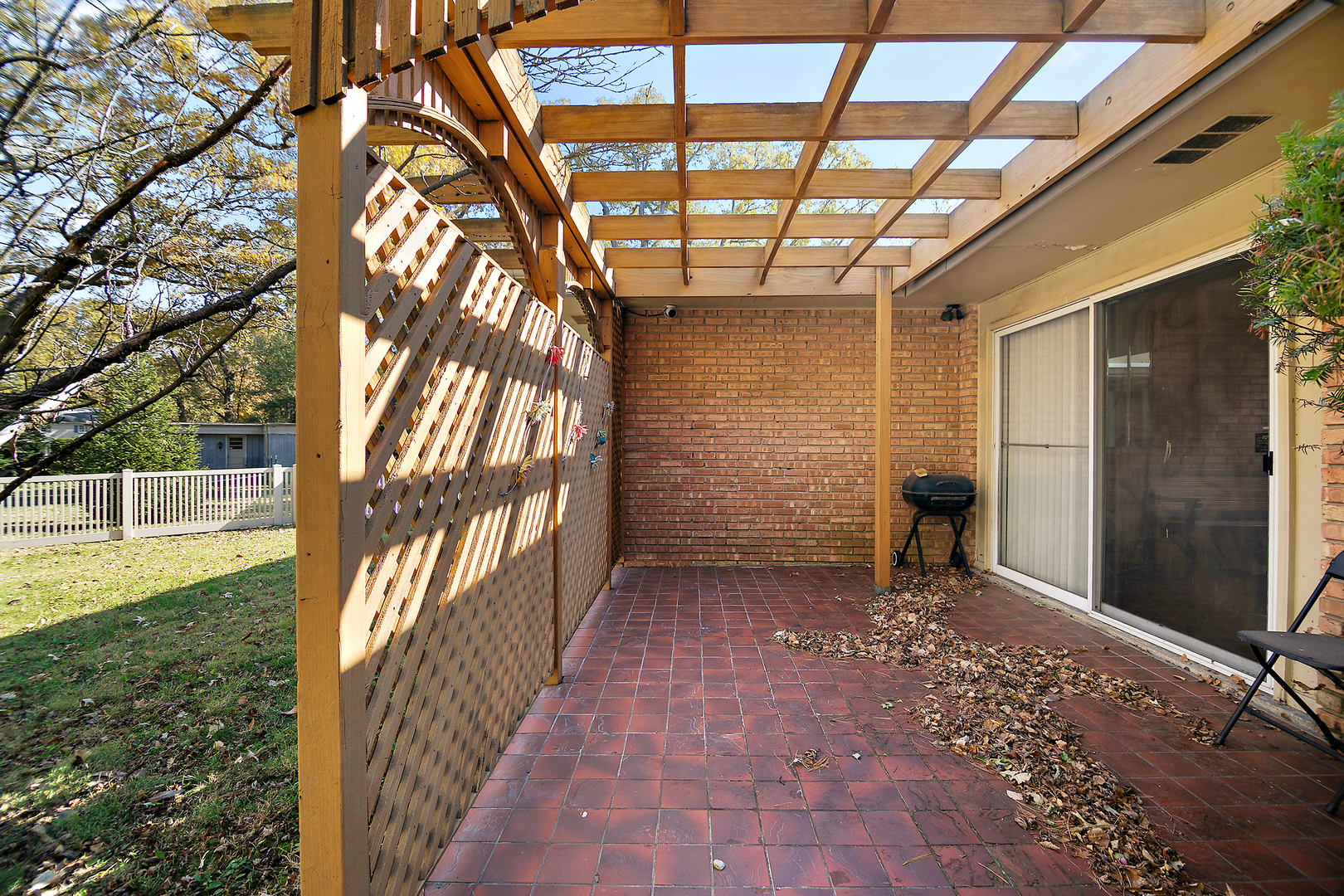 1305 Oaktree Lane Kankakee, IL 60901 - Photo 39 of 47 a view of a porch with a backyard