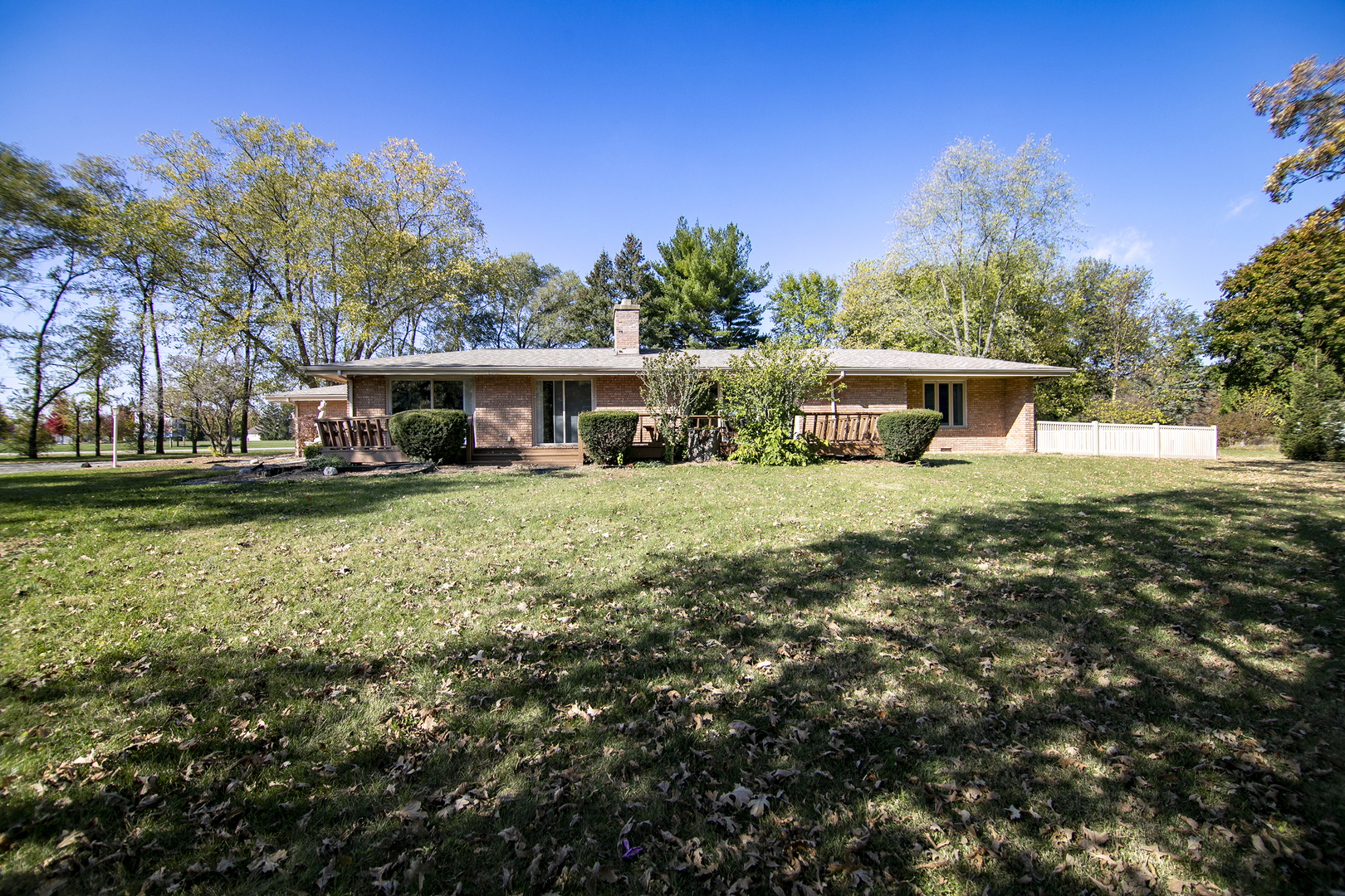 1305 Oaktree Lane Kankakee, IL 60901 - Photo 4 of 47 a view of a house with a yard table and chairs