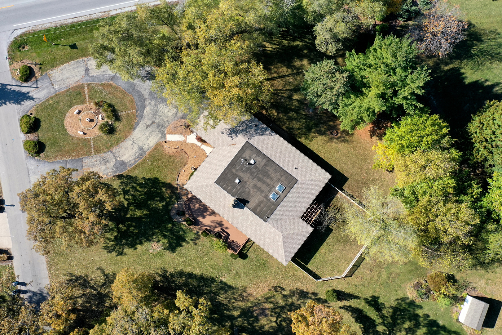1305 Oaktree Lane Kankakee, IL 60901 - Photo 7 of 47 an aerial view of a house with a yard and garden