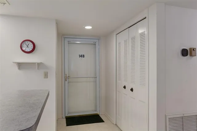 a kitchen with stainless steel appliances a stove a sink and a refrigerator