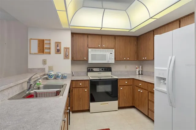 a bedroom with a bed and a flat screen television