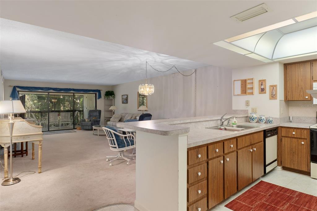 1 Cypress Run, Unit 14B Homosassa, FL 34446 - Photo 22 of 73 a kitchen with a sink a counter top space and appliances