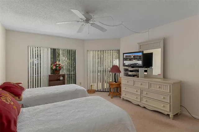 a bathroom with a double vanity sink and mirror