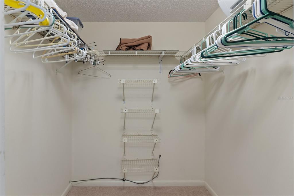 1 Cypress Run, Unit 14B Homosassa, FL 34446 - Photo 32 of 73 a view of walk in closet with empty racks