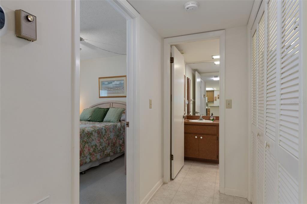 1 Cypress Run, Unit 14B Homosassa, FL 34446 - Photo 34 of 73 a en suite bathroom with a granite countertop sink and a mirror