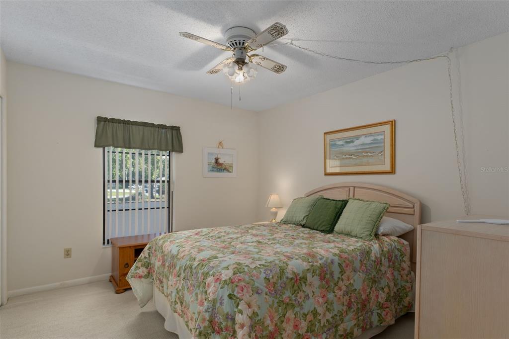 1 Cypress Run, Unit 14B Homosassa, FL 34446 - Photo 35 of 73 a bedroom with a bed and a window