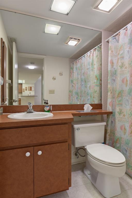1 Cypress Run, Unit 14B Homosassa, FL 34446 - Photo 38 of 73 a bathroom with a toilet a sink and mirror