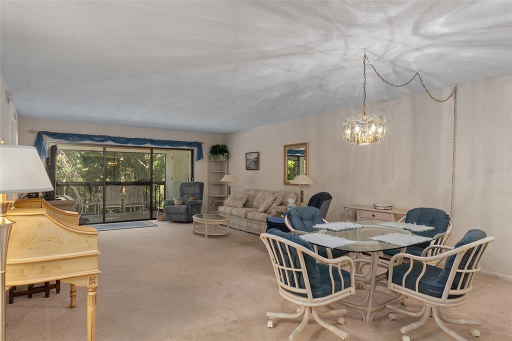 1 Cypress Run, Unit 14B Homosassa, FL 34446 - Photo 6 of 73 a view of a livingroom with furniture window and outside view