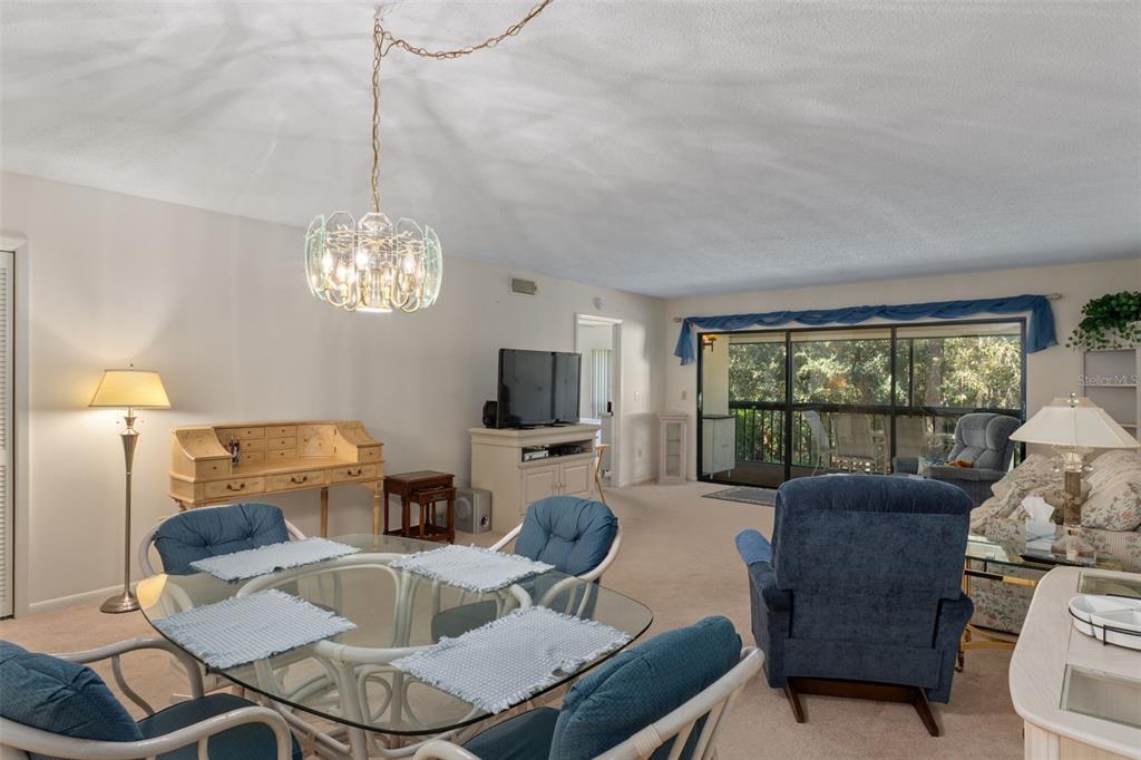 1 Cypress Run, Unit 14B Homosassa, FL 34446 - Photo 7 of 73 a living room with fireplace furniture and a flat screen tv