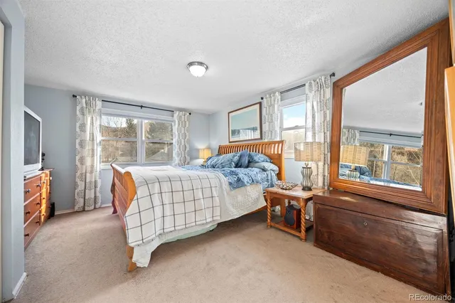 a bathroom with a sink a mirror and a bathtub