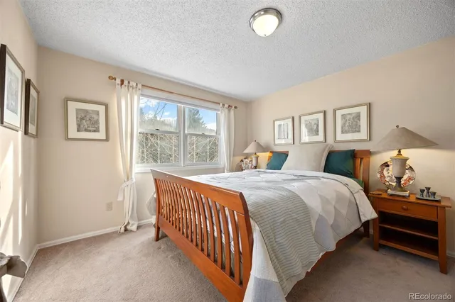 a bathroom with a bathtub a sink and a mirror
