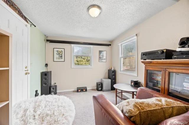 a room with furniture and a window