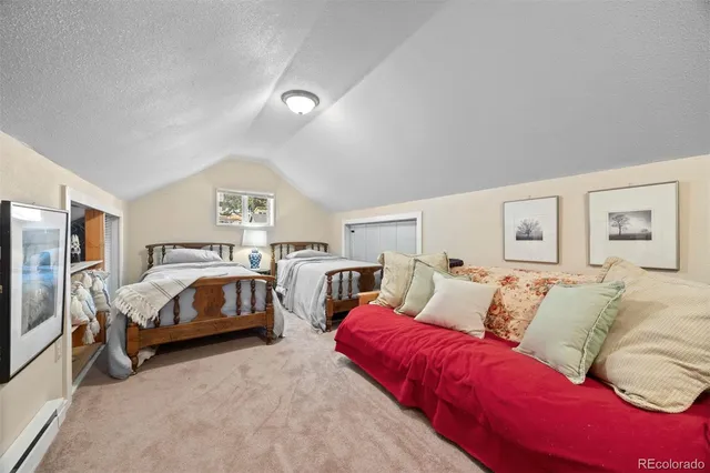 a room with furniture and pool table