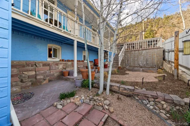 a front view of a house with basket ball court