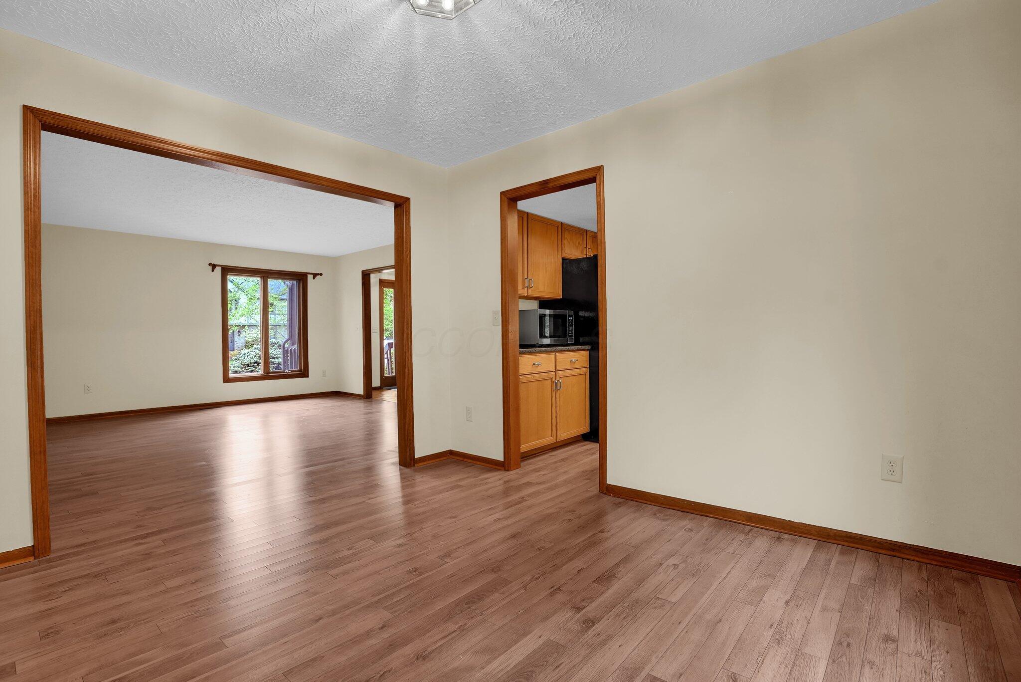 623 Rockbridge Road Westerville, OH 43081 - Photo 10 of 63 Formal dining room has easy access to the kitchen and overlooks the beautiful backyard through beautiful windows!