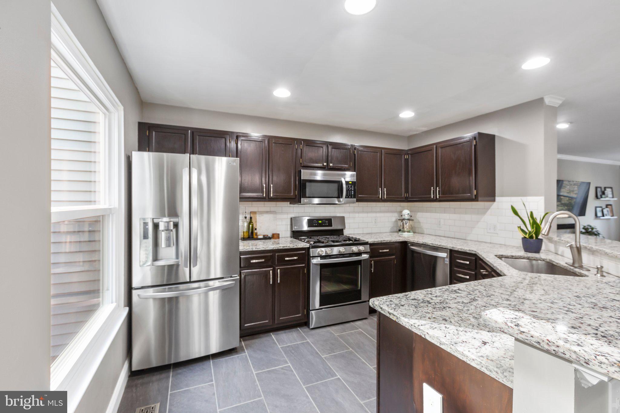 409 Crossing Road Fredericksburg, VA 22406 - Photo 8 of 43 There are recessed lighting & ample counter space