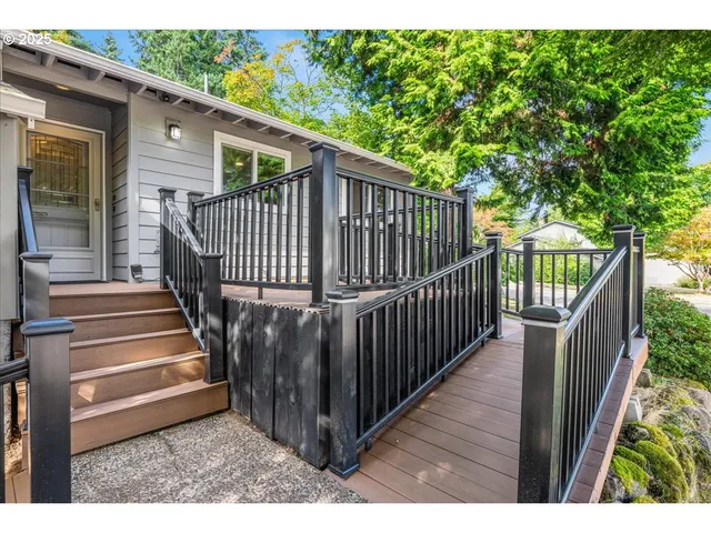a view of a porch with wooden floor