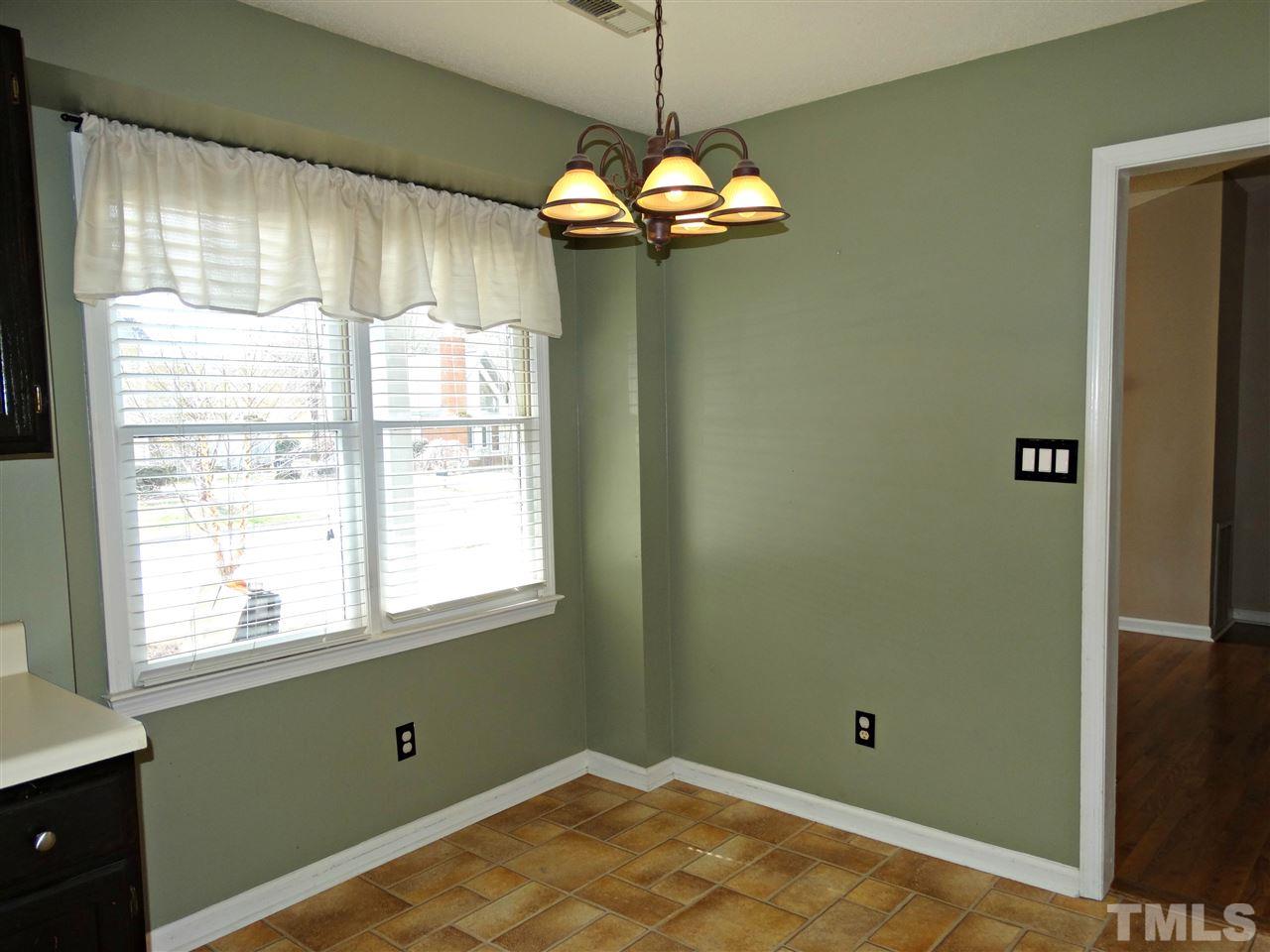 109 Longneedle Court Raleigh, NC 27603 - Photo 14 of 23 a view of a livingroom with window