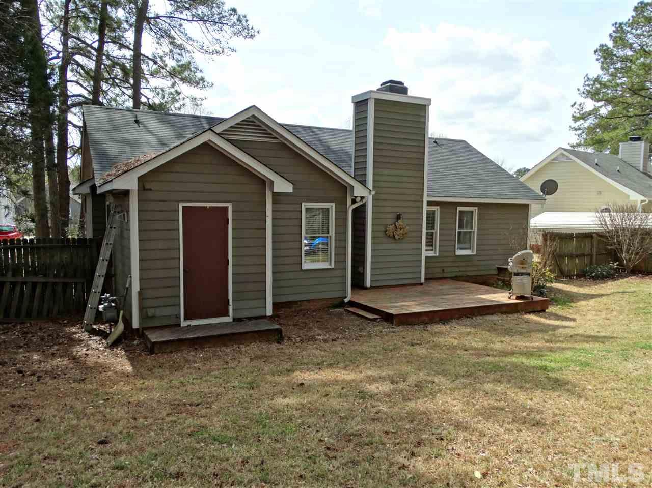 109 Longneedle Court Raleigh, NC 27603 - Photo 22 of 23 a view of a house with a yard