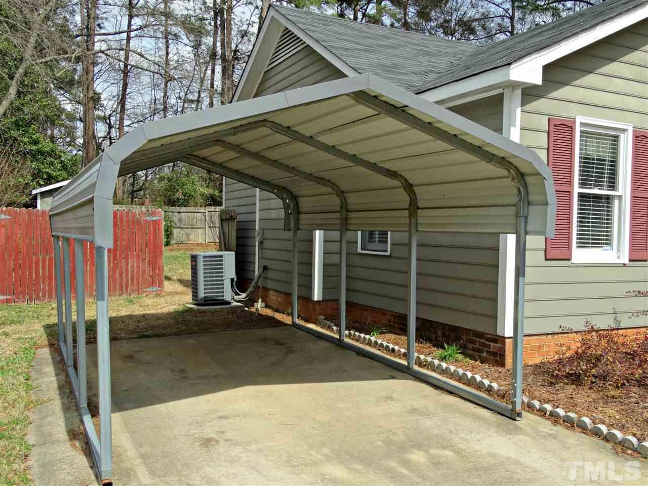109 Longneedle Court Raleigh, NC 27603 - Photo 4 of 23 a view of a house with a garage