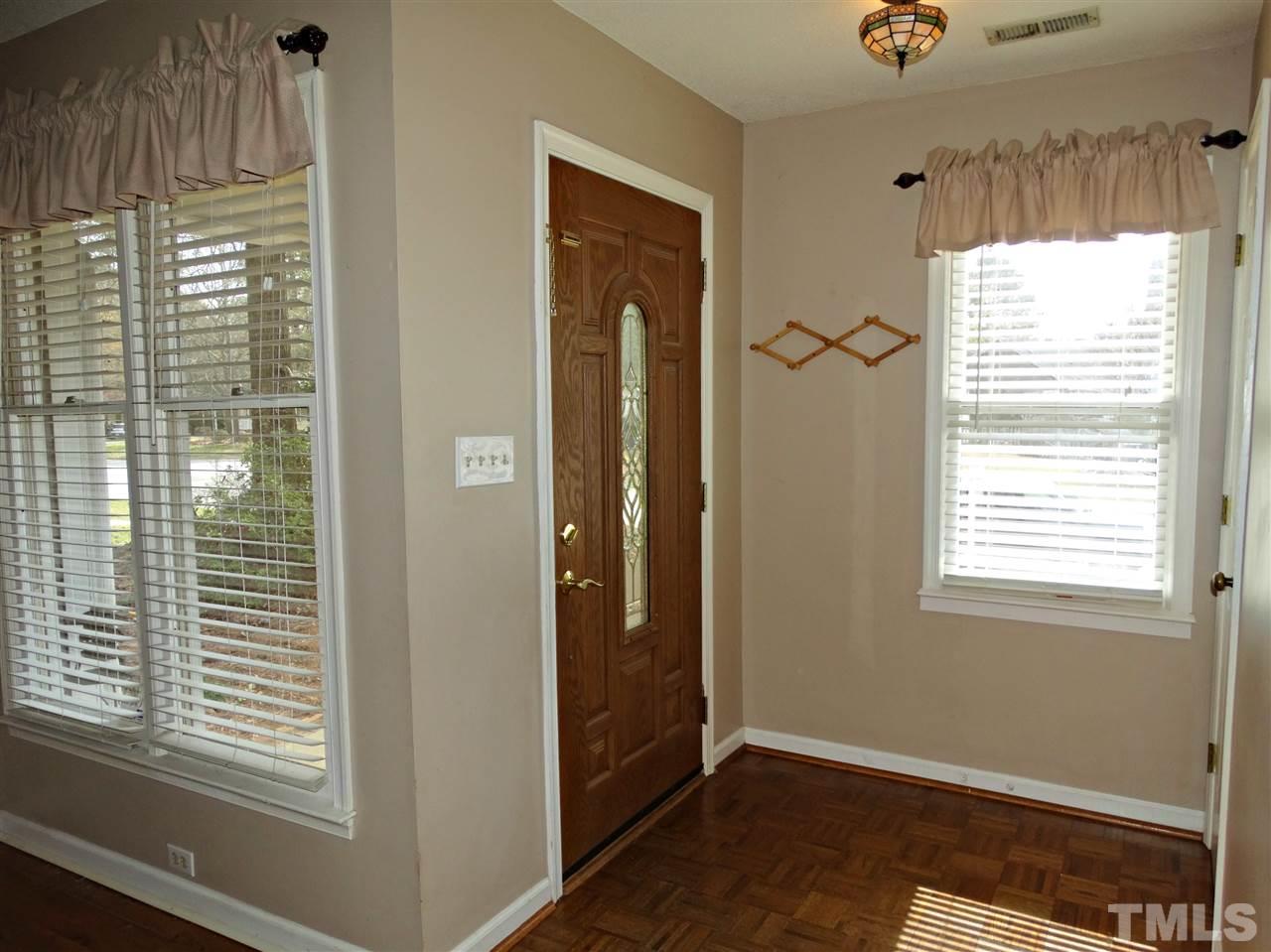 109 Longneedle Court Raleigh, NC 27603 - Photo 6 of 23 a view of an empty room with a window