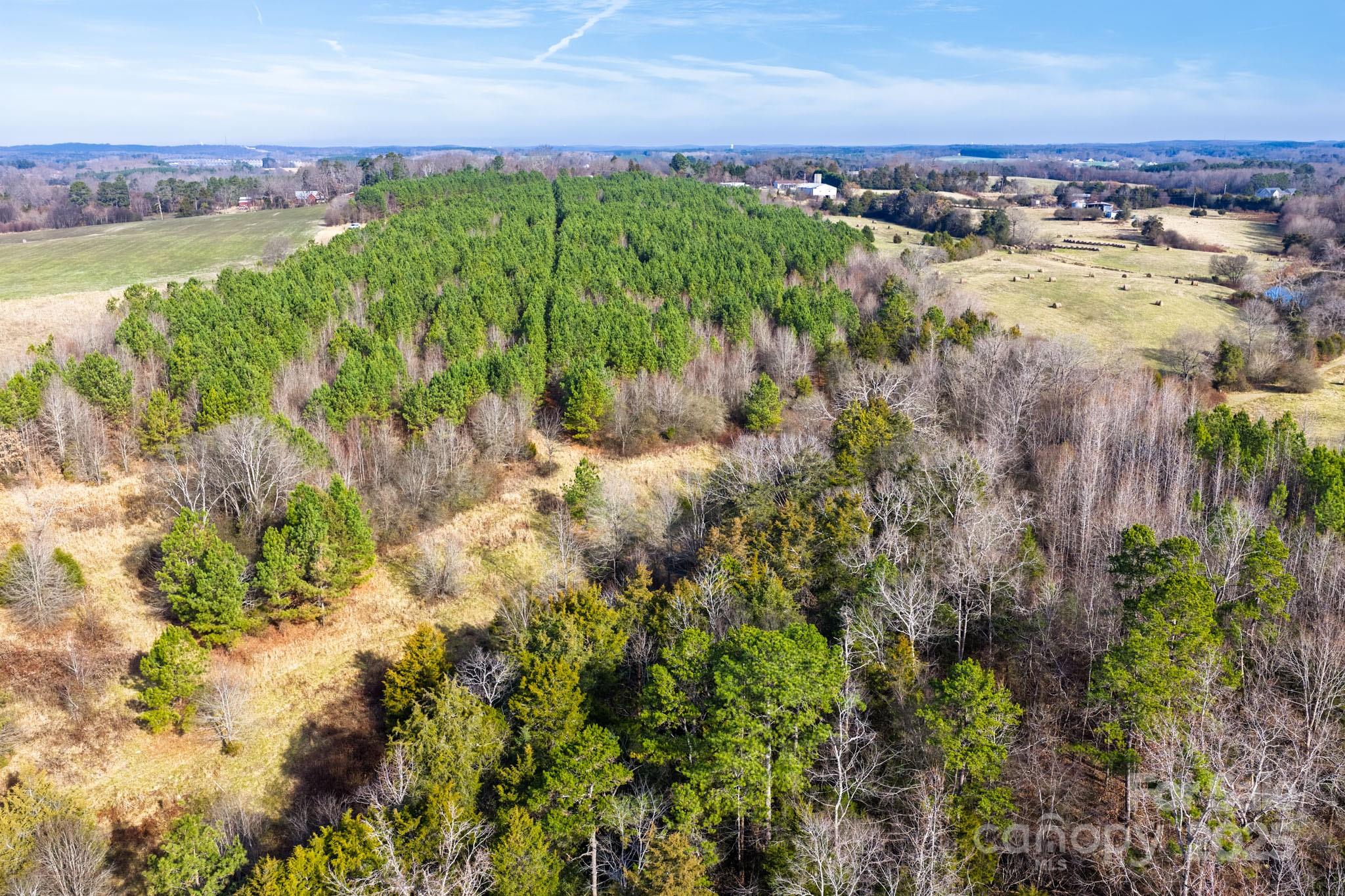 0 Ingold School Road Albemarle, NC 28001 - Photo 3 of 21 a view of a lake with a city