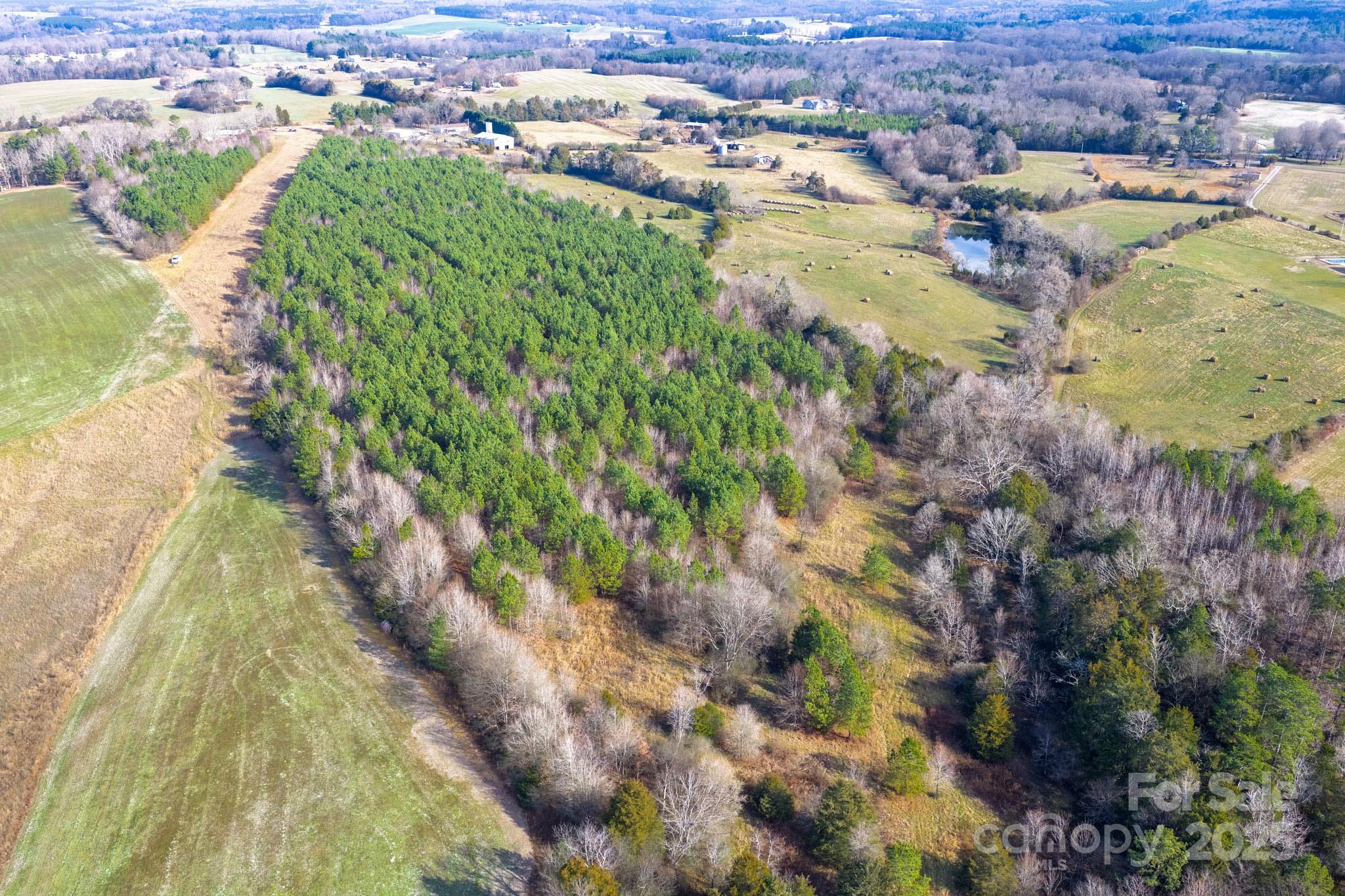 0 Ingold School Road Albemarle, NC 28001 - Photo 4 of 21 an aerial view of residential houses with outdoor space