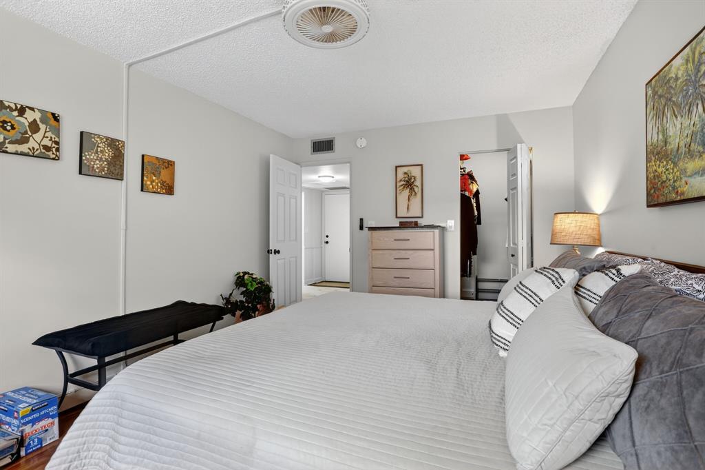 5640 Southwest 3rd Place, Unit 208 Margate, FL 33068 - Photo 16 of 26 a bedroom with bed and window