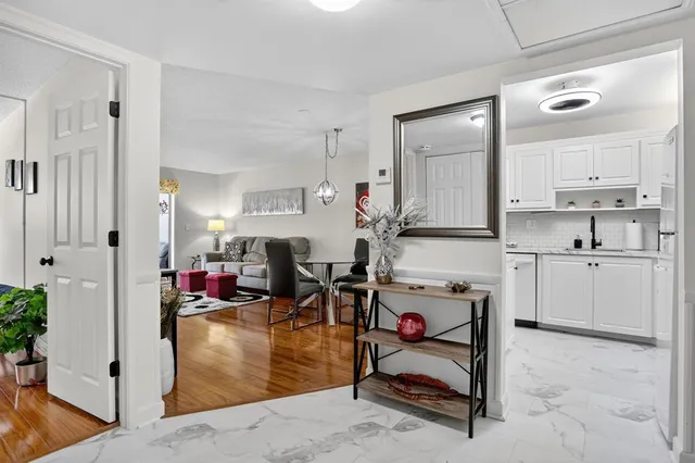 a view of a kitchen and dining room