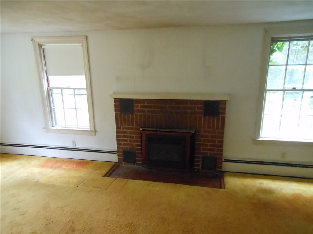 69 East Killingly Road Foster, RI 02825 - Photo 5 of 25 LIVING ROOM WITH FIREPLACE