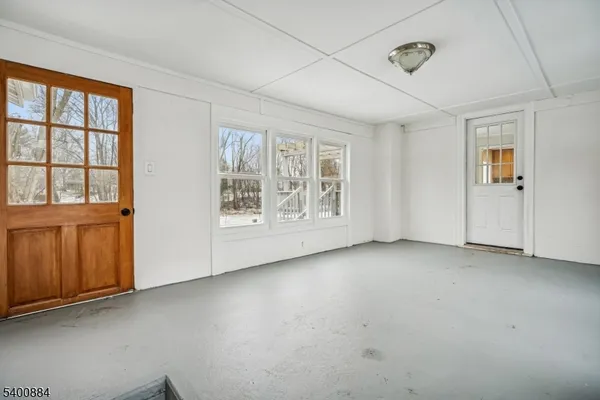 an empty room with windows