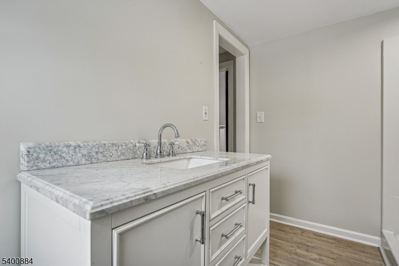 68 Valley Road Hillsborough, NJ 08844 - Photo 26 of 38 a utility room with cabinets and sink