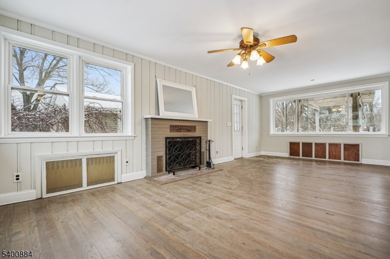 68 Valley Road Hillsborough, NJ 08844 - Photo 5 of 38 a view of an empty room with a window and fireplace