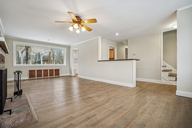 68 Valley Road Hillsborough, NJ 08844 - Photo 6 of 38 a view of an empty room with wooden floor and a window
