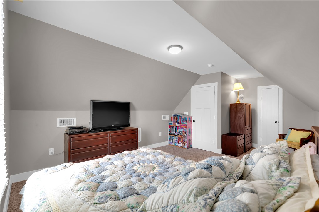 181 Amberwood Drive Anderson, SC 29621 - Photo 23 of 28 This cozy bedroom features sloped ceilings and ample space, perfect for relaxation.