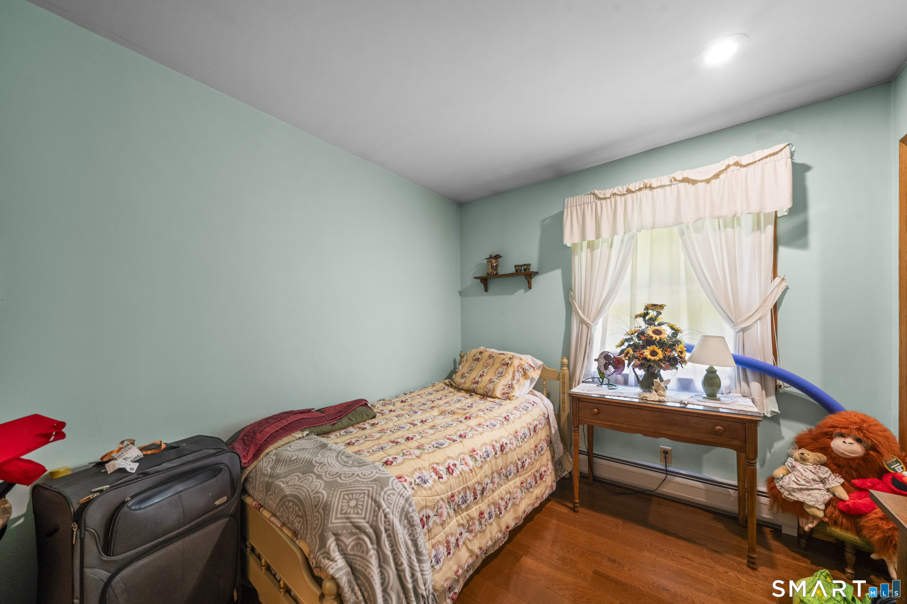 80 Holmes Road Goshen, CT 06756 - Photo 27 of 40 a bedroom with a bed and a window