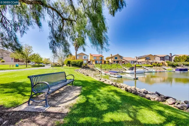 a view of a lake with a yard