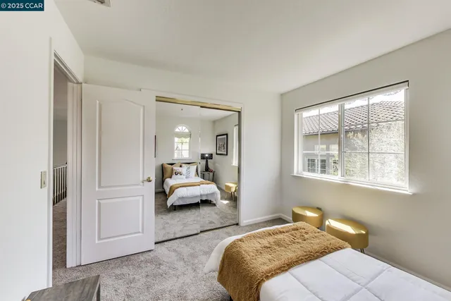 a living room with furniture and a bath tub