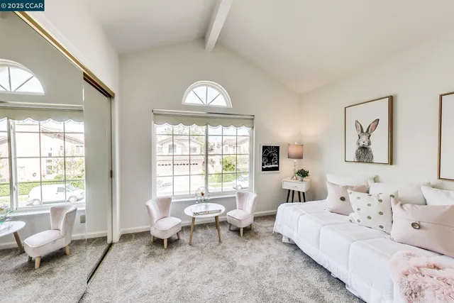 a workspace with furniture and a window