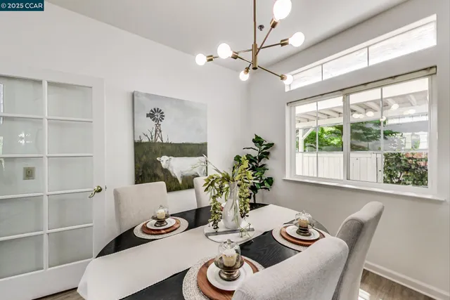 a view of a dining room with furniture